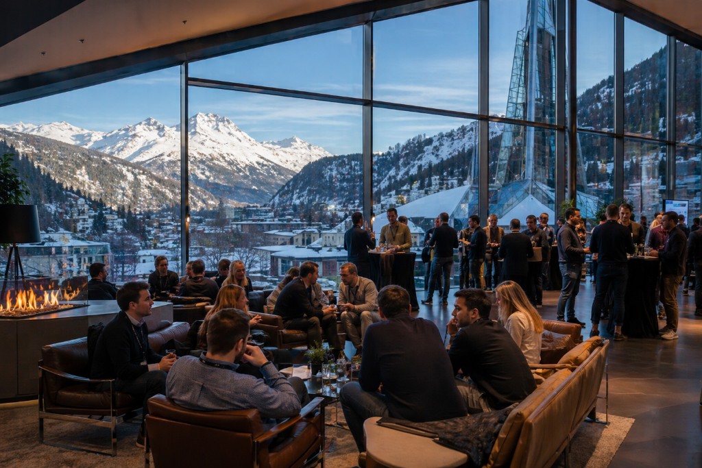 A warm lounge with a fire and mountain views